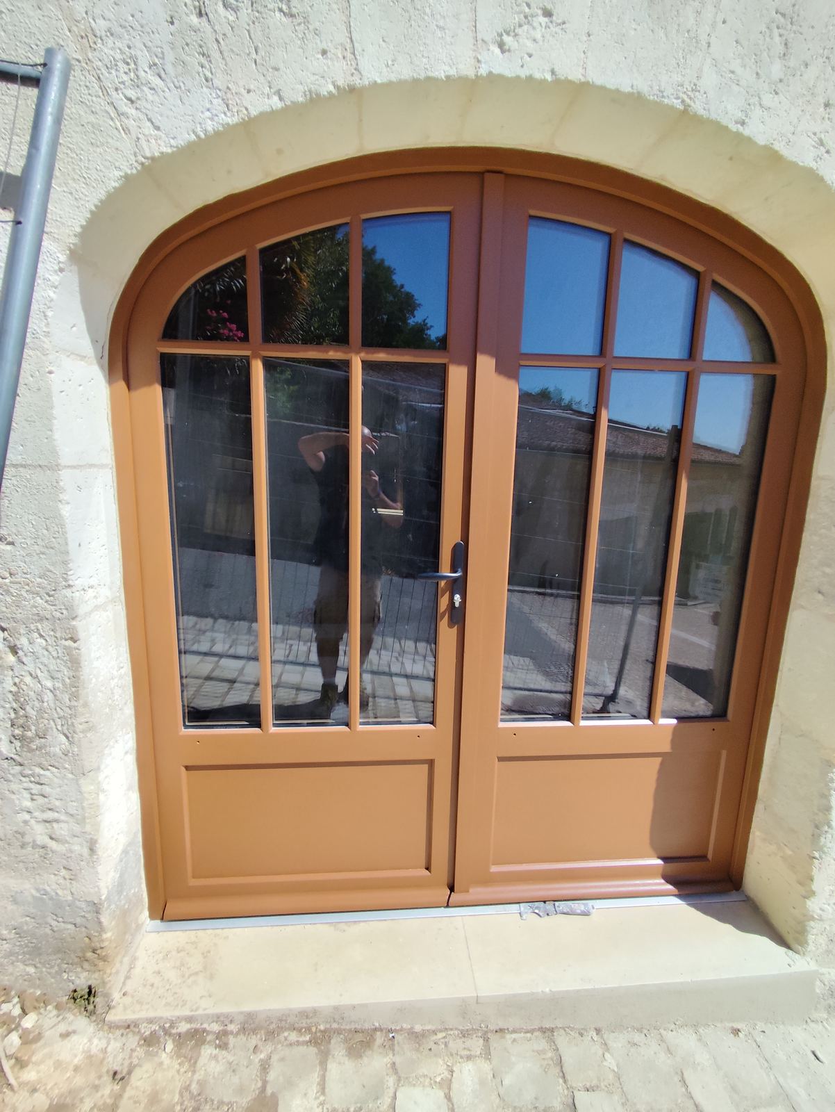 Porte-fenêtre bois cintrée